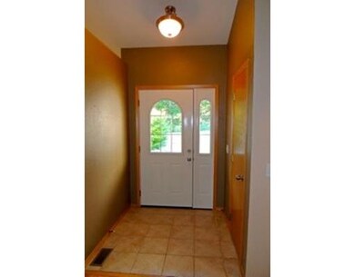 Exterior Front. Entry w/tile flooring and coat closet.