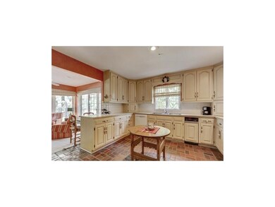 Kitchen with brick flooring