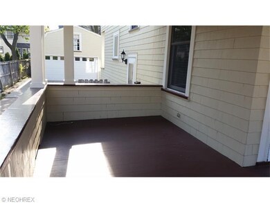 Cedar shingles and front porch nook for enjoying the warm summer days with a book!