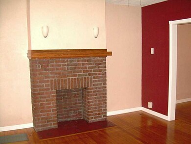 Living Room. Decorative fireplace accents the room
