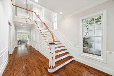 Showcasing an elegant gallery style entryway with