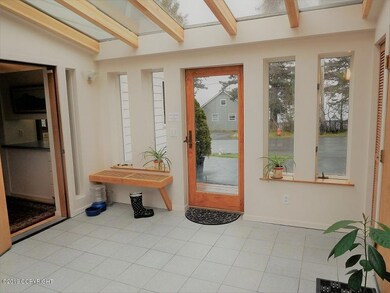 1711 Mission Rd Sunroom front entry