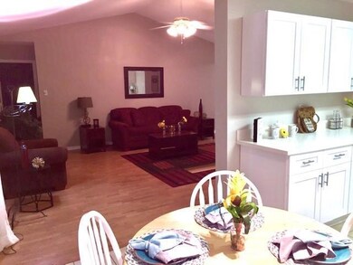 Great site lines to the Den from the Kitchen.