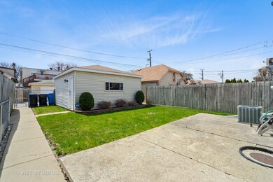 5107 W Wellington Ave, Chicago, IL 60641 - photo 3