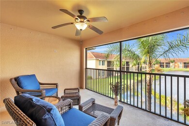 Lanai featuring ceiling fan and a water view