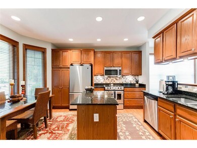 Kitchen features granite countertops, SS appliance