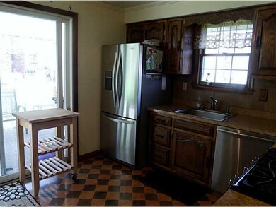 Kitchen. Nice Size Kitchen with Sliding Glass Door