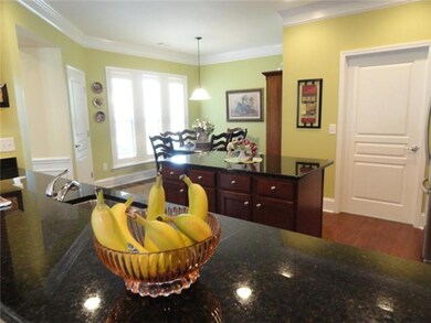 Stainless appliances!  The pantry is the door to the left.
