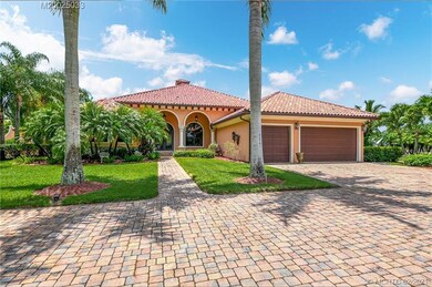 Main house with 3 car garage.
