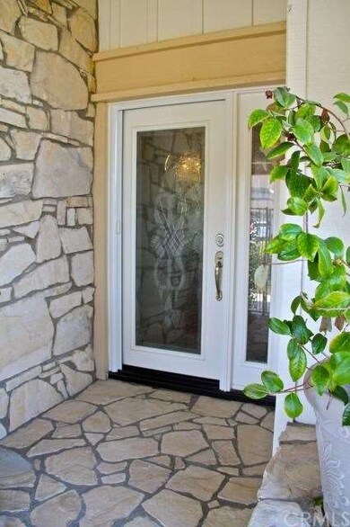 Etched glass entry door and sidelite.