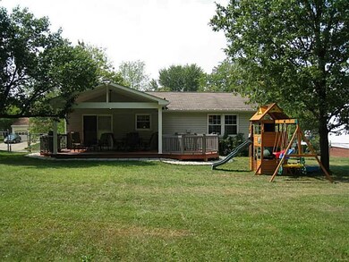 Exterior Back. Beautiful outdoor oasis.