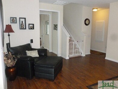 Living Area, Stairwell to Upstairs