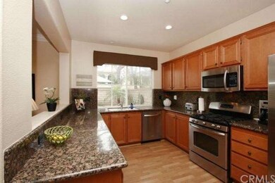 Highly upgraded kitchen has custom cabinetry with 