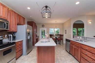 spacious gourmet kitchen with center island and pr