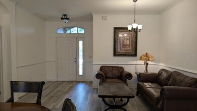Living room and front door.  furniture can stay or be removed