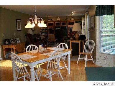 Family Room Kitchen family room- Nice hardwood flo