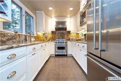 Remodeled kitchen with granite counters, Viking ap