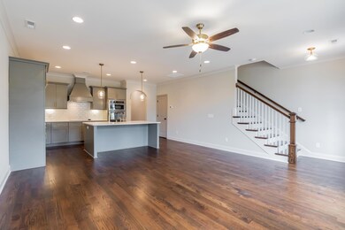 Includes Sand and Finish hardwood throughout the main level with Dark Walnut stain.