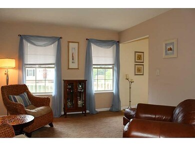 Living Room. A VIEW FROM THE DINING ROOM.