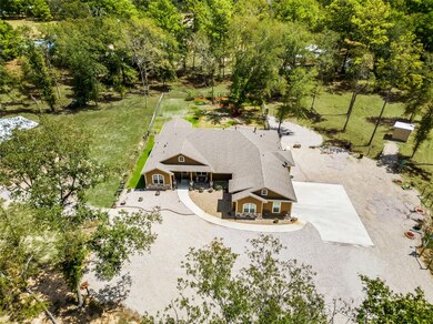 Enjoy 5-acres of unrestrictd land on a secluded dead-end road. Immediate backyard is fenced along with the perimeter of the property.