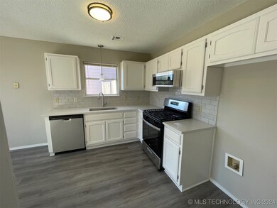 Tastefully updated kitchen with NEW appliances and