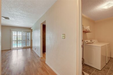 Entry area and laundry room at front entry