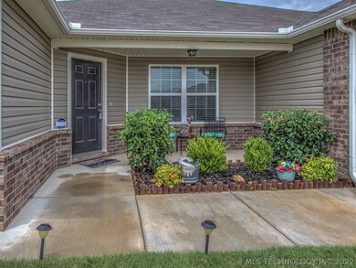 Front porch to enjoy, brick & vinyl siding for low