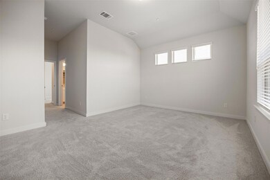 Unfurnished room with light colored carpet, lofte