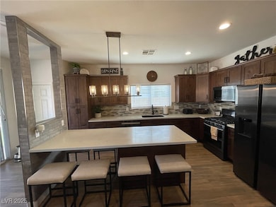 Kitchen with appliances with stainless steel finis