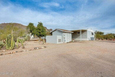 Main driveway in and view of back of hom