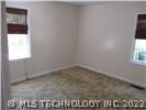 Southwest Bedroom, hardwood floor under carpeting