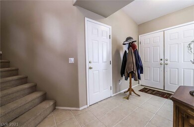 Features formal entry with tile flooring