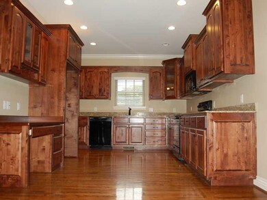 Kitchen. Custom knotty alder cabinets with granite countertops