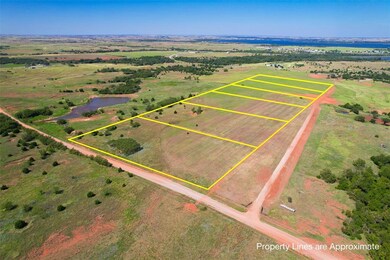 Birds eye view of property with a rural view