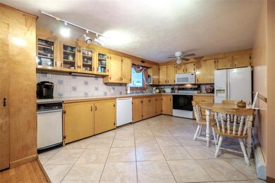 Large Eat-in Kitchen with Tile Floor