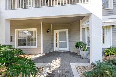 Property entrance featuring a balcony