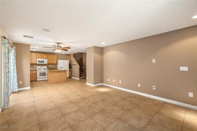Unfurnished living room featuring ceiling fan, lig