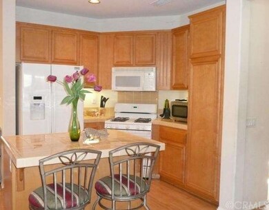 A Center island compliments this wonderful kitchen