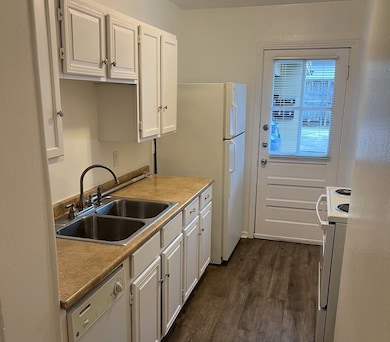 Kitchen with gas stove.