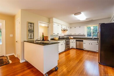 Fully renovated kitchen featuring granite countert