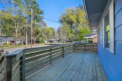 NEW FRONT PORCH ADDS PRIVATE OUTDOOR LIVING SPACE.