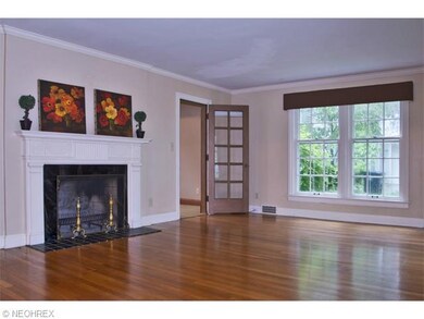 Living Room with Fireplace.  Door leads to Great R