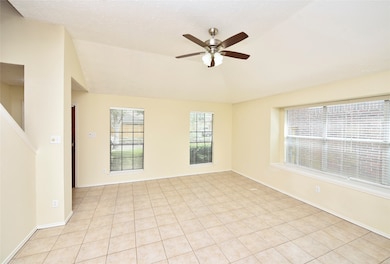Tile throughout downstairs and wood on stairs and