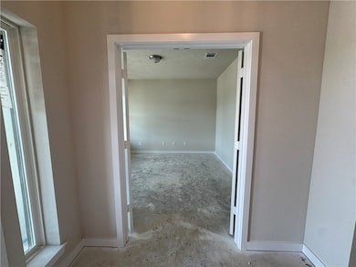 Hallway with baseboards