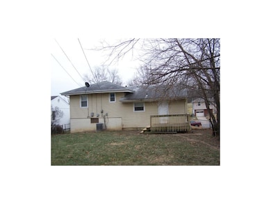 Exterior Rear of Home with Deck off Dining Area