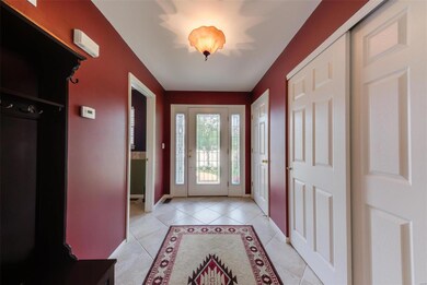 Ceramic Tile floor entry with etched glass and sid