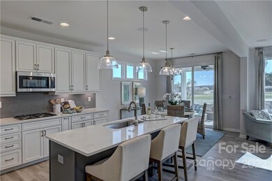 REPRESENTATIVE PHOTOS. The kitchen is bright and open w/ great countertop space.