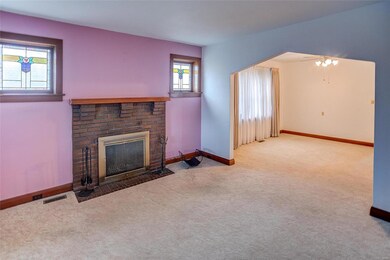 Living room opens up to dining