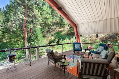 Wooden terrace featuring outdoor lounge area