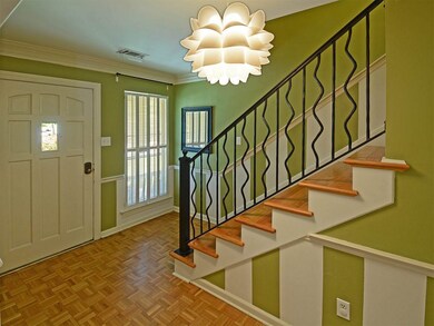 Custom metal railing and unusual light fixture!